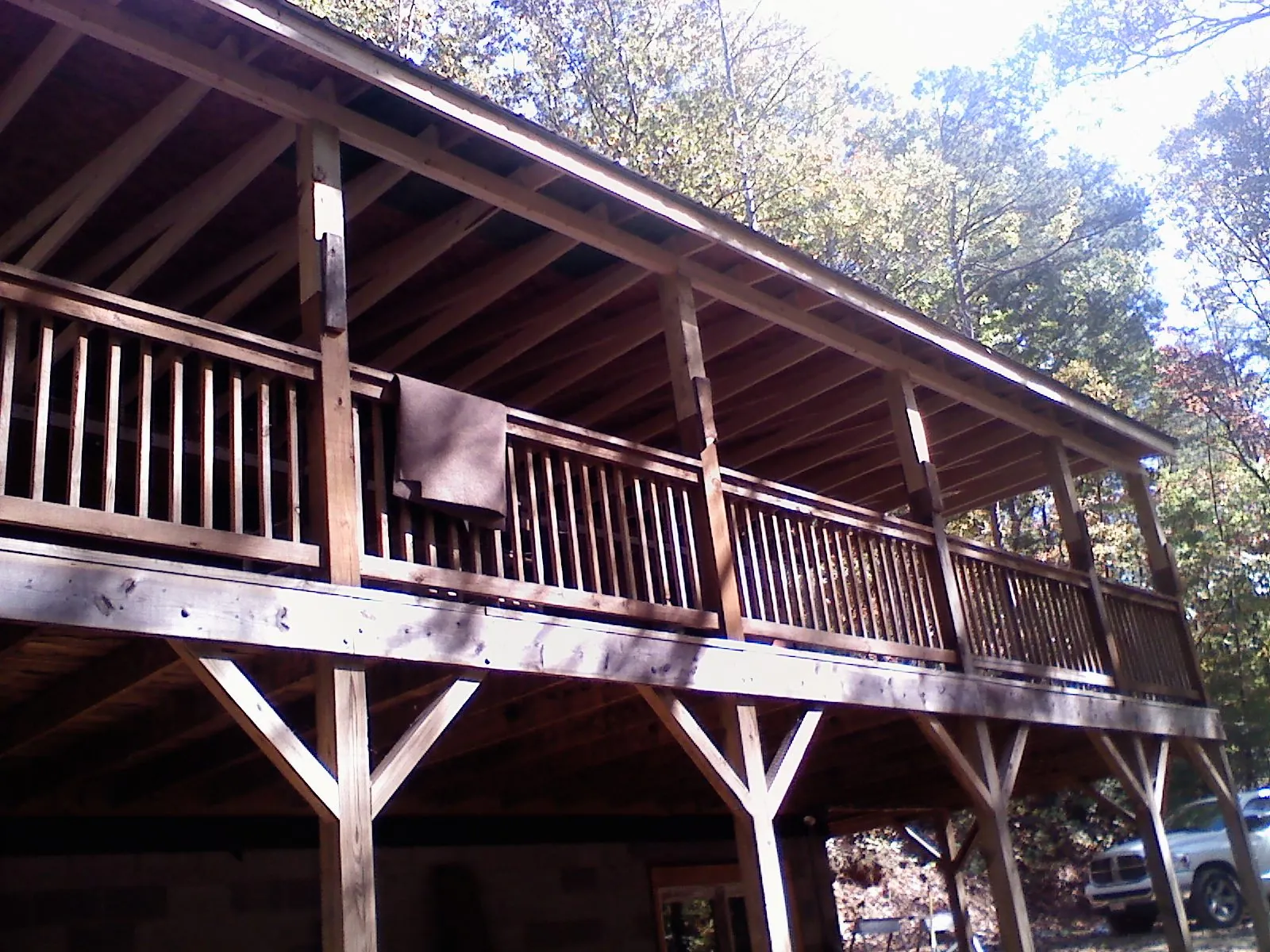 Timber framing under a new elevated porch and deck — Roof Leak Repair in Dover AFB by Roofing Brothers